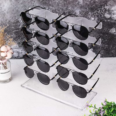 Les lunettes de soleil transparentes d'ODM des verres de présentoir étirent le support